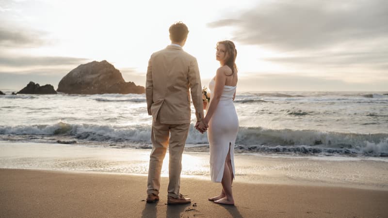 Mother cradling her newborn baby in soft natural light — Cocomel Portraits