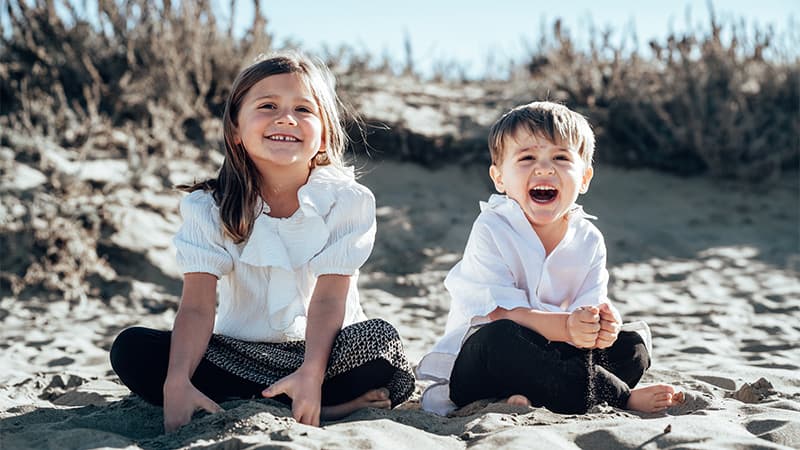 Couple sharing a quiet moment under oak trees during golden hour — Cocomel Portraits